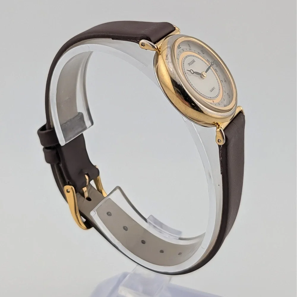 Pulsar V249-0030 Date Pointer Gold Tone White Dial Brown Leather Women's Watch